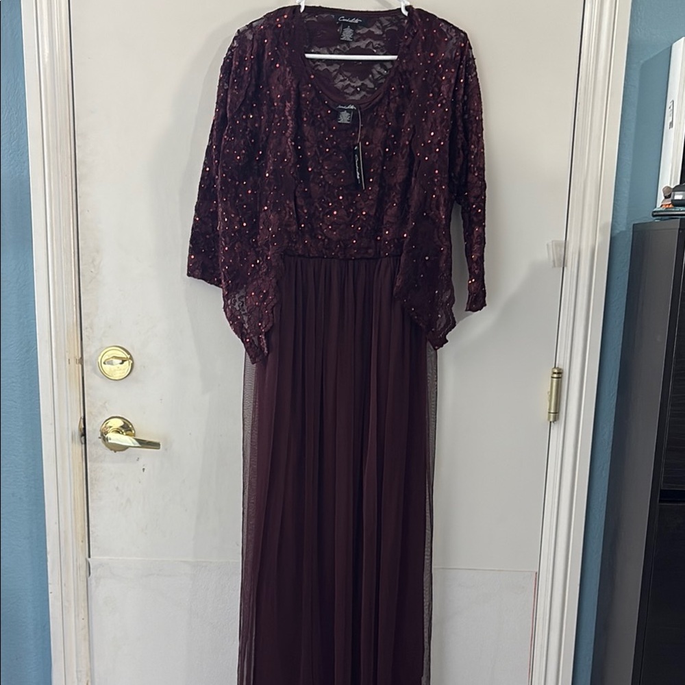 Elegant Purple Gown with Plunge Neckline and Dolman Sleeves Jacket.
